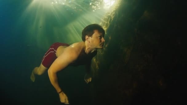 Man Dives Freshwater River Sunny Rays Shining Water — Stock Video