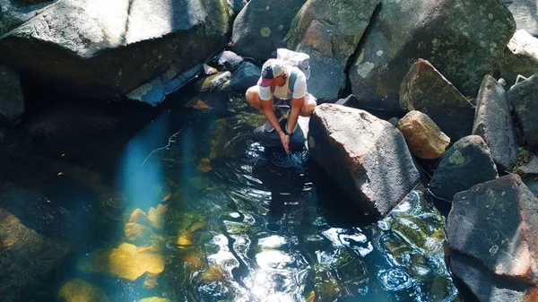 Male Hiker Washes His Hands Clean Forest River — Stock Photo, Image