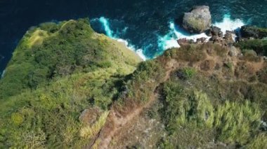 Aerial view of the steep edge coast of Nusa Penida island. Bali, Indonesia
