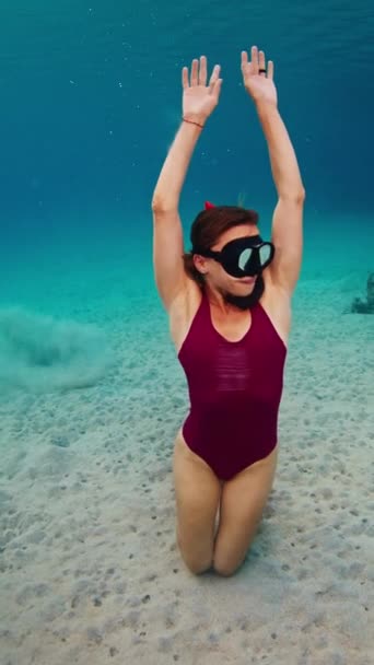Woman Freediver Pink Suit Relaxes Underwater Enjoys Swimming Tropical Sea — Stock Video