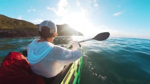 Man Paddles Kayak Sea Sunrise — Stock Video