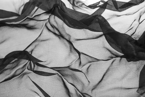 Arkaplan olarak şeffaf siyah kumaş. Tasarım ayrıntıları. Tasarım elemanları. Makro. 