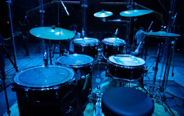 drum set on stage in a concert hall. Large-sized photo with soft change selectivity. Vintage live music background