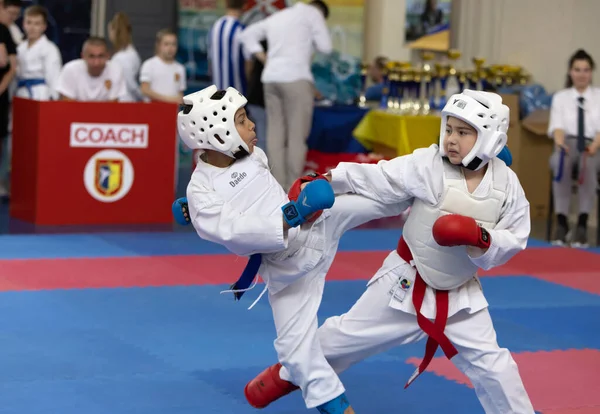stock image ODESSA, UKRAINE - JUNE 3, 22023: Participants in karate competition among children. Many children participate in martial arts tournament for first time. Karate competition. Performances of fighters