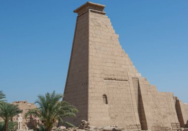 Hieroglypic carvings on entrance wall at the ancient egyptian Karnak Temple in Luxor Egypt