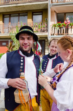 Folk festival in traditional costumes with songs and dances. Date 29.09.2024, village Sosuvka, South Moravia, Czech Republic. clipart