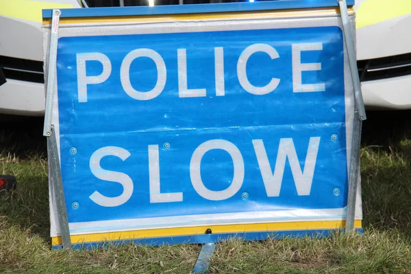 Police Slow Free Standing Road Traffic Warning Sign — Stock Photo, Image