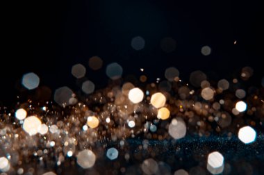 Noellerin soyut ve ışıltılı arka planlı bokeh ışığı .