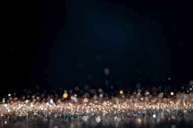 Noellerin soyut ve ışıltılı arka planlı bokeh ışığı .