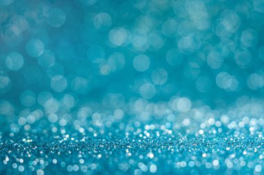 Beyaz açık mavi parıltılı bokeh deseni soyut arkaplan .