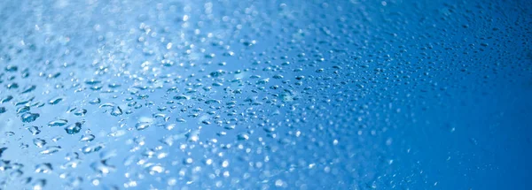 Zbliżenie Deszcz Niebieski Woda Spada Płytkiej Głębi Ostrości — Zdjęcie stockowe