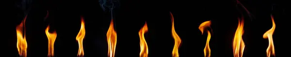 黒の背景の上に火のテクスチャ — ストック写真