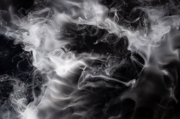Movement of smoke,Abstract white smoke on black background . 
