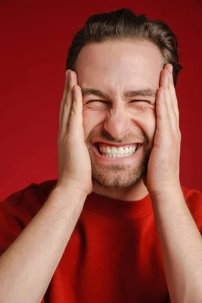 Young Bristle Man Wearing Sweater Grimacing Holding His Head Isolated — Stock Photo, Image