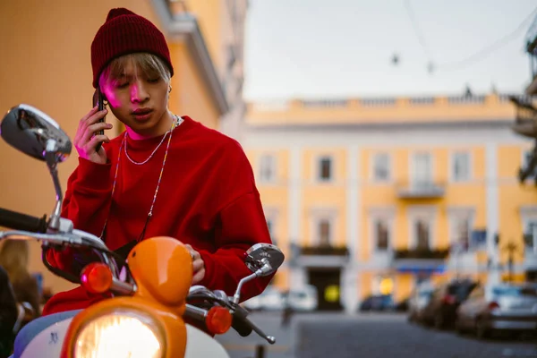 Asian Boy Talking Cellphone While Sitting Scooter City Street — Stock Photo, Image