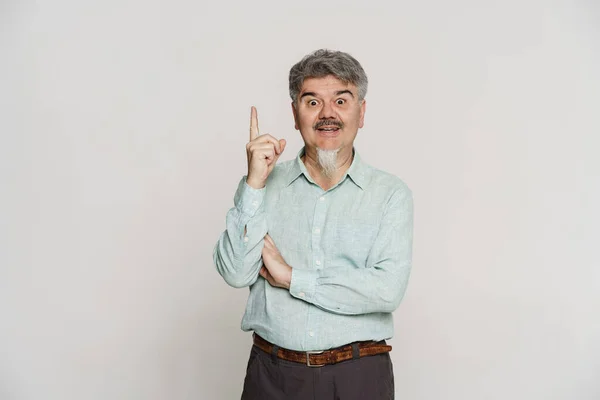 Mature Man Pointing Finger Upward While Expressing Surprise Isolated White — Stock Photo, Image