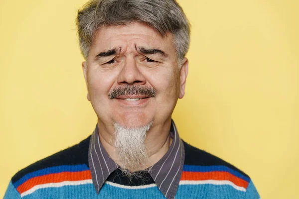 Mature Man Grey Beard Smiling Looking Camera Isolated Yellow Background — Stock Photo, Image