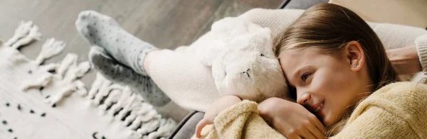 White Girl Smiling Hugging Her Toy While Resting Her Granddaughter — ストック写真