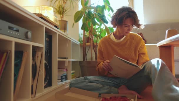 Pensive Brunette Woman Eyeglasses Reading Book Home Floor — Stock Video