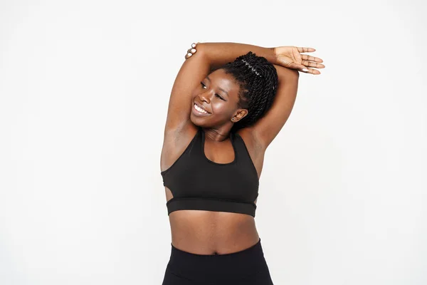 Schwarze Junge Frau Macht Sport Während Sie Isoliert Vor Weißem — Stockfoto