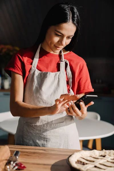 Young Hispanic Brunette Woman Wearing Apron Taking Photo Meal While — Stock Photo, Image