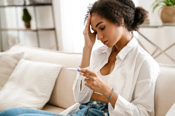 Young Black Woman Being Upset While Holding Pregnancy Test Sitting — Stock Photo, Image