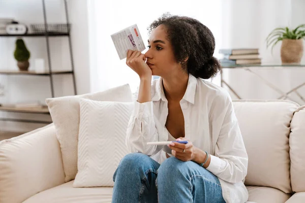 Young Black Woman Being Upset While Holding Pregnancy Test Sitting — Stock Photo, Image