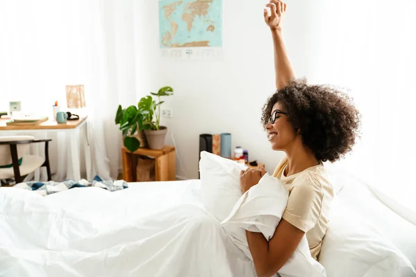 African American Young Woman Curly Hairstyle Stretching Bed Sleep Home — Stock Photo, Image