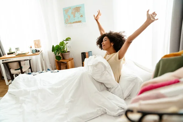 African American Young Woman Curly Hairstyle Stretching Bed Sleep Home — Stock Photo, Image