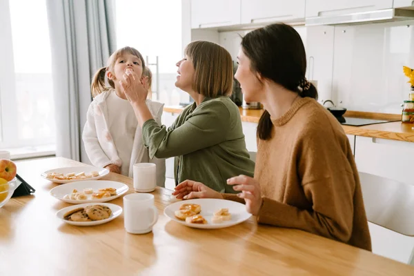 White family having breakfast while spending time together at home