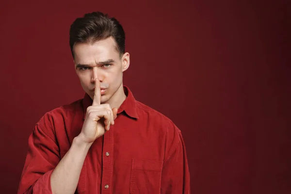 Young White Man Frowning Showing Silence Gesture Camera Isolated Red — Stock Photo, Image