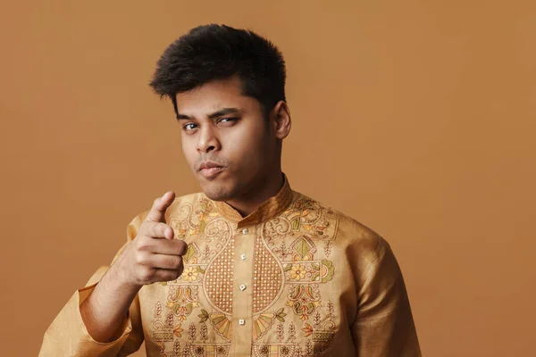 Young Indian Man Smiling Pointing Fingers Camera Isolated Yellow Background — ストック写真