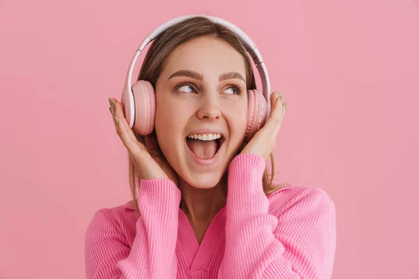 Young Enthusiastic Girl Opened Mouth Pink Headphones Standing Isolated Pink — Stock Photo, Image