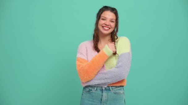 Smiling Young Woman Pigtails Waving Hand Camera Turquoise Studio — Stok video