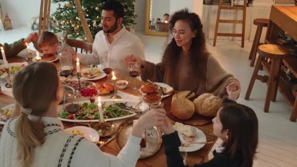 Handsome Multicultural Family Prays While Celebrating Christmas Home — 비디오