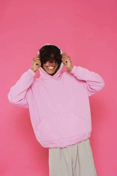 Young Caribbean Man Piercing Smiling While Posing Camera Isolated Pink — Foto de Stock