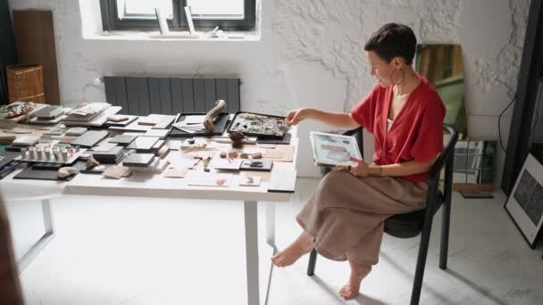 Cute Brunette Woman Architect Working Tablet Looking Samples Table Office — Video Stock