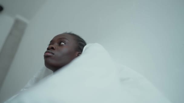 Confident African Woman Pigtails Depression Covered Blanket Sitting Bed Home — Vídeo de Stock