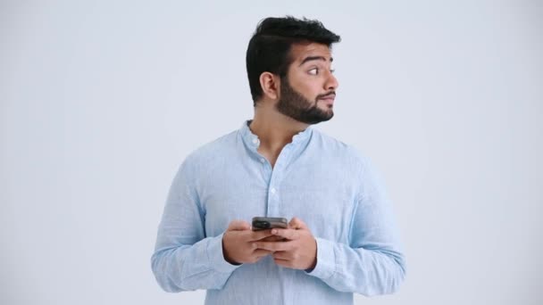 Happy Indian Man Piercing Wearing Blue Shirt Typing Mobile Looking — Stock video