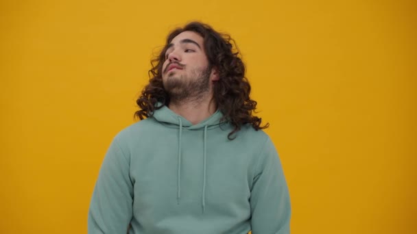 Bored Long Haired Man Blue Hoodie Waiting Something Looking Yellow — Video Stock