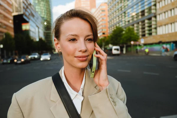Young Beautiful Calm Business Woman Talking Phone Looking Aside While — 图库照片