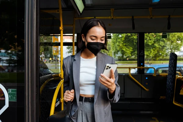 Young Asian Woman Looking Mobile Phone Screen While Traveling Bus — Stock Photo, Image