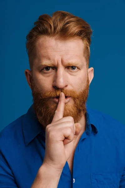 Adult Handsome Redhead Bearded Frowning Man Doing Silence Gesture Finger — 图库照片