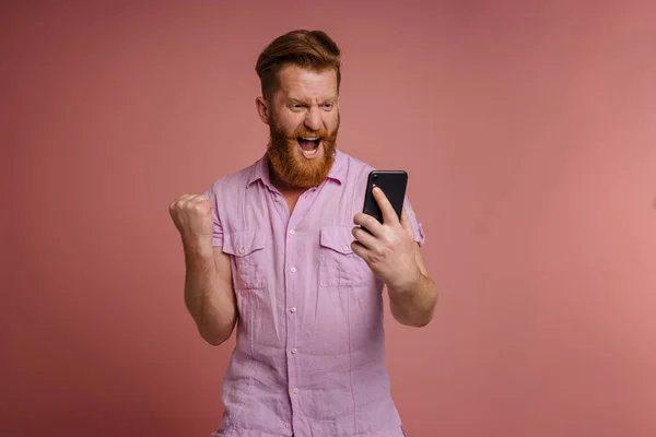 Adult Handsome Stylish Redhead Bearded Enthusiastic Man Pink Shirt Raised — Stockfoto