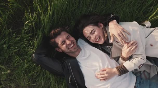 Laughing Couple Talking Hugging While Lying Picnic Blanket Field Sea — Stock Video