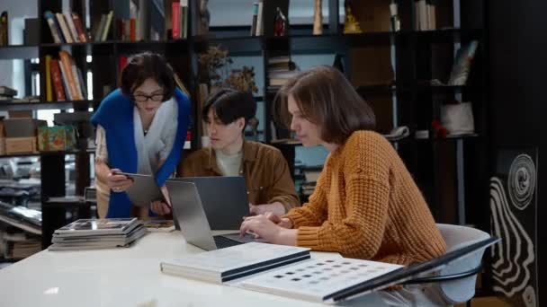 Serious Multinational Colleagues Designers Discuss Working Laptops Working Space — Stock Video