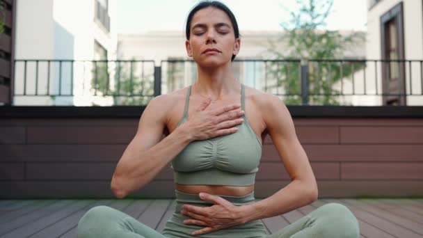 Serious Brunette Woman Meditating While Doing Breathing Exercises Hotel Balcony — стоковое видео