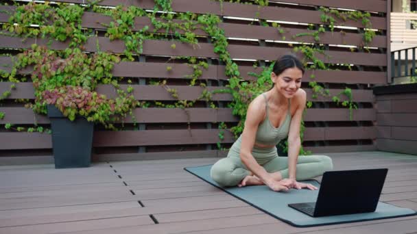 Happy Brunette Woman Talking Video Call Laptop Yoga Practice Hotel — стоковое видео