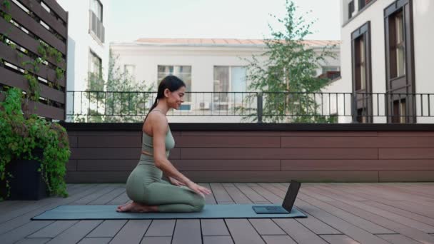 Positive Brunette Woman Talking Video Call Laptop Meditating While Sitting — Vídeos de Stock