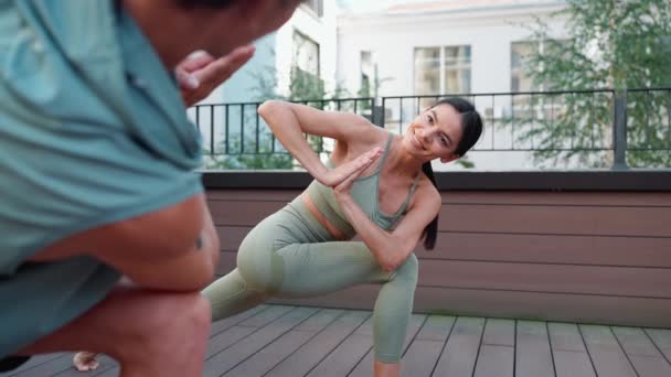 Smiling Couple Athletes Doing Yoga Exercises Looking Each Other Hotel — Vídeos de Stock